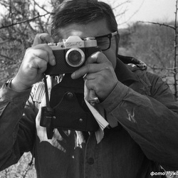 Человек с фотоаппаратом